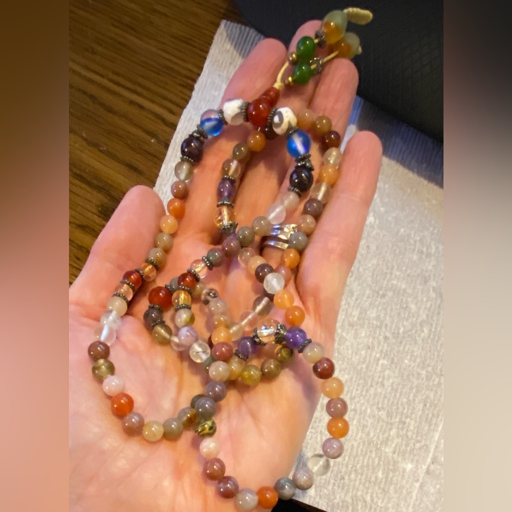 16” strand of multi Mala beads w/clear quartz, silver spacers & beaded tassels